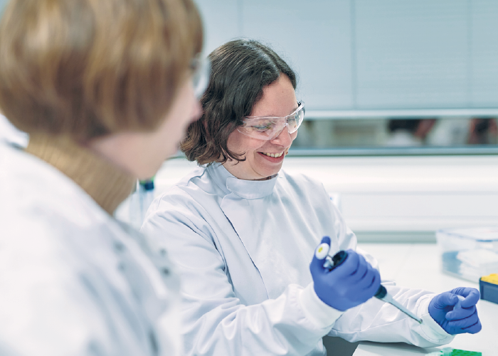 Two cancer researchers